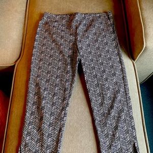 Size .5 Chicos women Capri pants with side zipper. Black and white